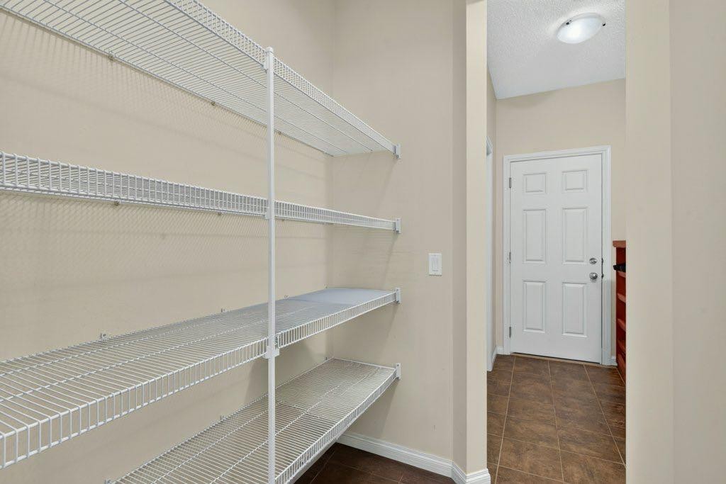 164 Aspenmere Close, Chestermere, AB - Indoor With Storage