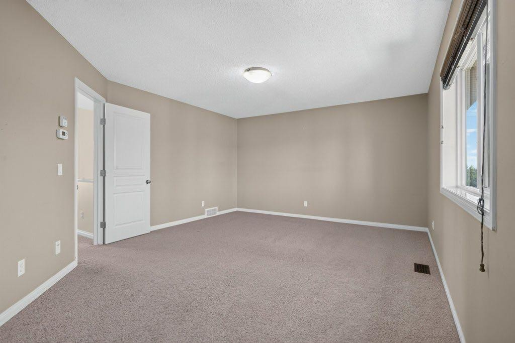 164 Aspenmere Close, Chestermere, AB - Indoor Photo Showing Other Room