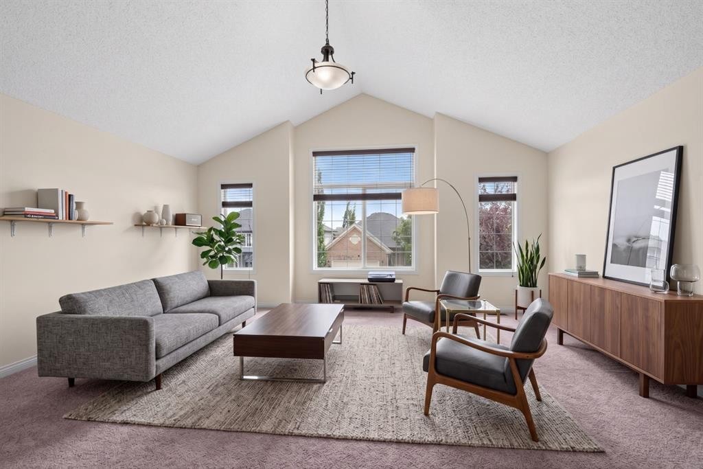 164 Aspenmere Close, Chestermere, AB - Indoor Photo Showing Living Room