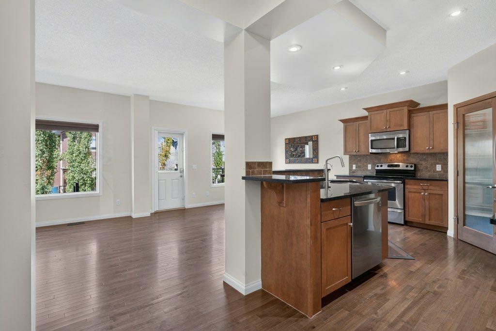 164 Aspenmere Close, Chestermere, AB - Indoor Photo Showing Kitchen With Stainless Steel Kitchen