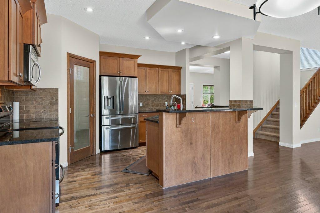 164 Aspenmere Close, Chestermere, AB - Indoor Photo Showing Kitchen With Stainless Steel Kitchen