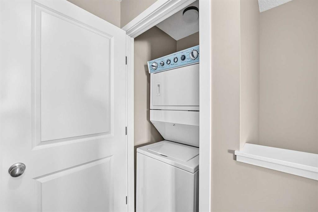 51 Evansview Gardens Nw, Calgary, AB - Indoor Photo Showing Laundry Room