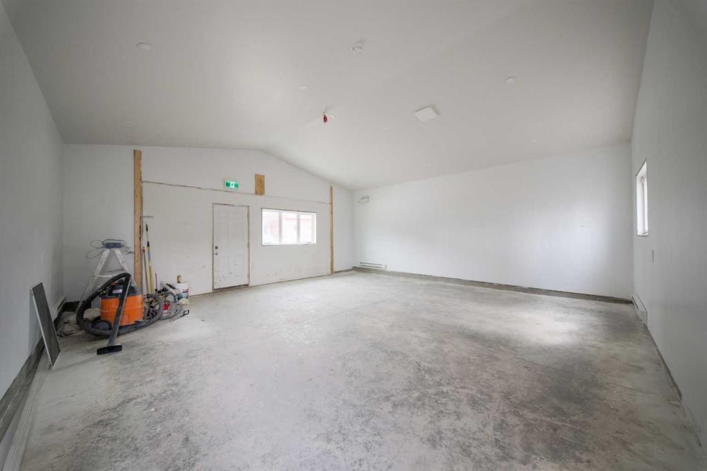 96 Fireside Common, Cochrane, AB - Indoor Photo Showing Other Room