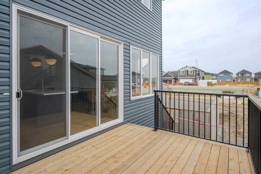 96 Fireside Common, Cochrane, AB - Outdoor With Deck Patio Veranda With Exterior