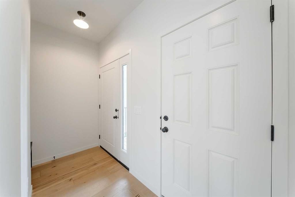96 Fireside Common, Cochrane, AB - Indoor Photo Showing Other Room