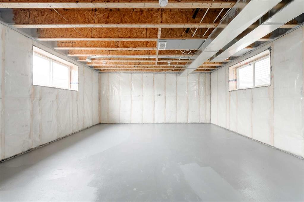96 Fireside Common, Cochrane, AB - Indoor Photo Showing Basement