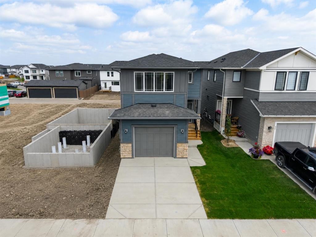 96 Fireside Common, Cochrane, AB - Outdoor With Facade