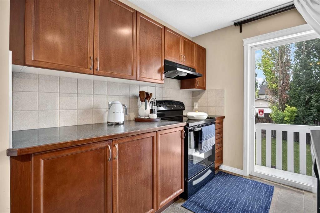 437 Tuscany Drive Nw, Calgary, AB - Indoor Photo Showing Kitchen