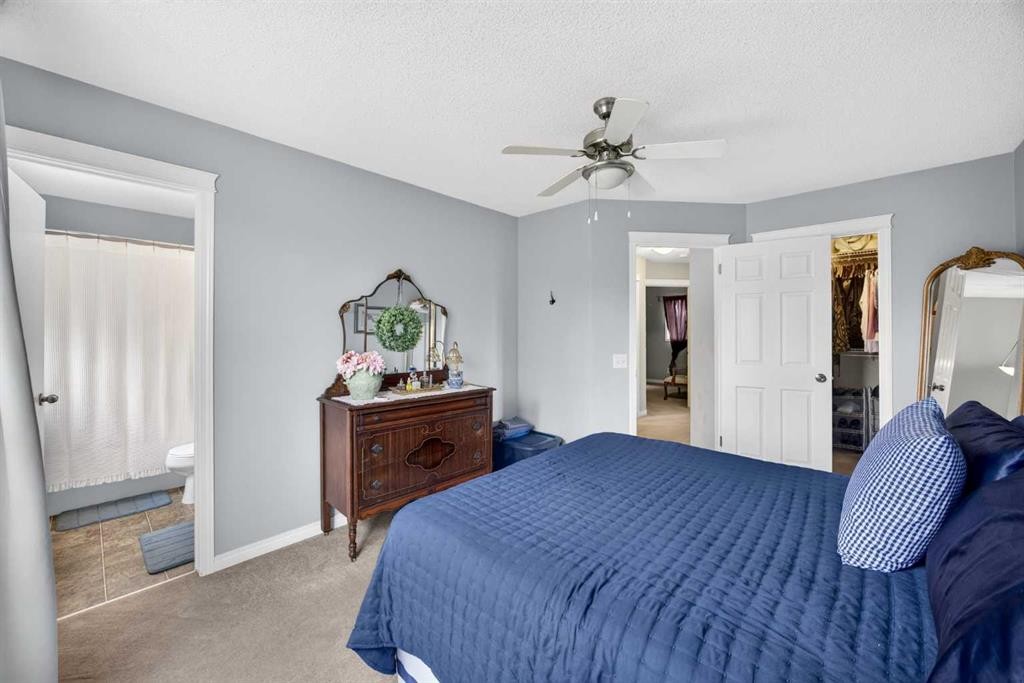 437 Tuscany Drive Nw, Calgary, AB - Indoor Photo Showing Bedroom