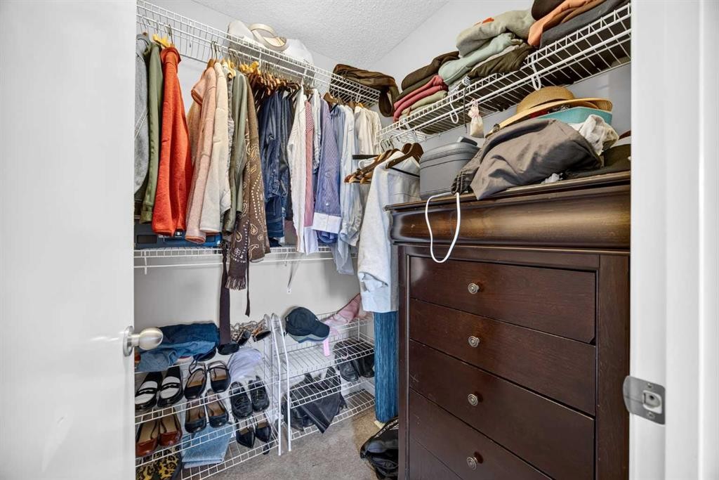 437 Tuscany Drive Nw, Calgary, AB - Indoor With Storage