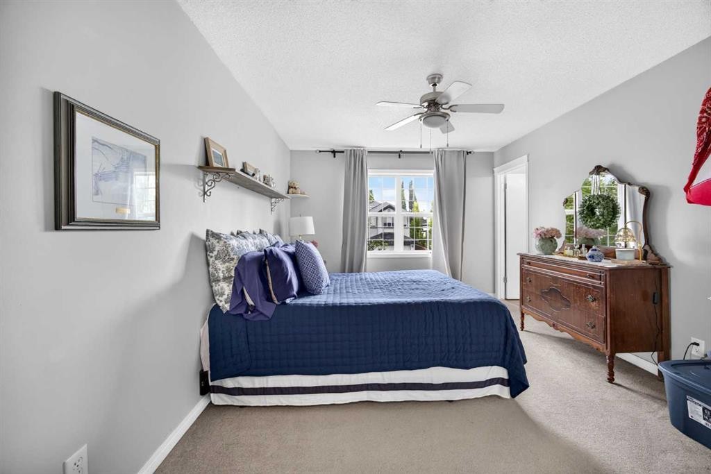 437 Tuscany Drive Nw, Calgary, AB - Indoor Photo Showing Bedroom