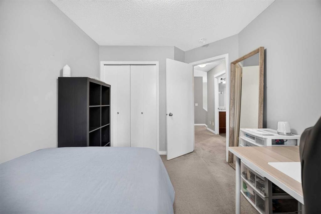 437 Tuscany Drive Nw, Calgary, AB - Indoor Photo Showing Bedroom