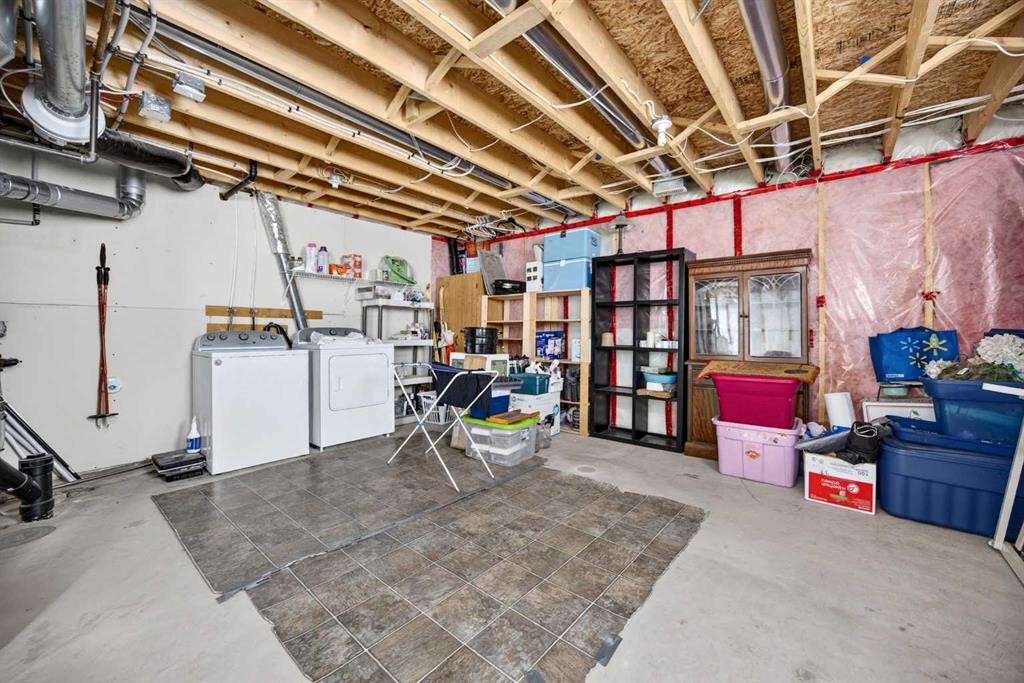 437 Tuscany Drive Nw, Calgary, AB - Indoor Photo Showing Basement
