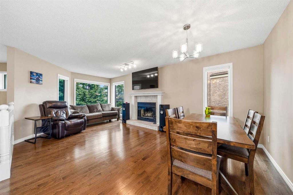 36 Shannon Circle Sw, Calgary, AB - Indoor Photo Showing Living Room With Fireplace