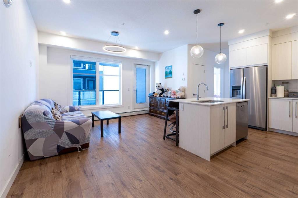 1207-681 Savanna Boulevard Ne, Calgary, AB - Indoor Photo Showing Kitchen With Upgraded Kitchen