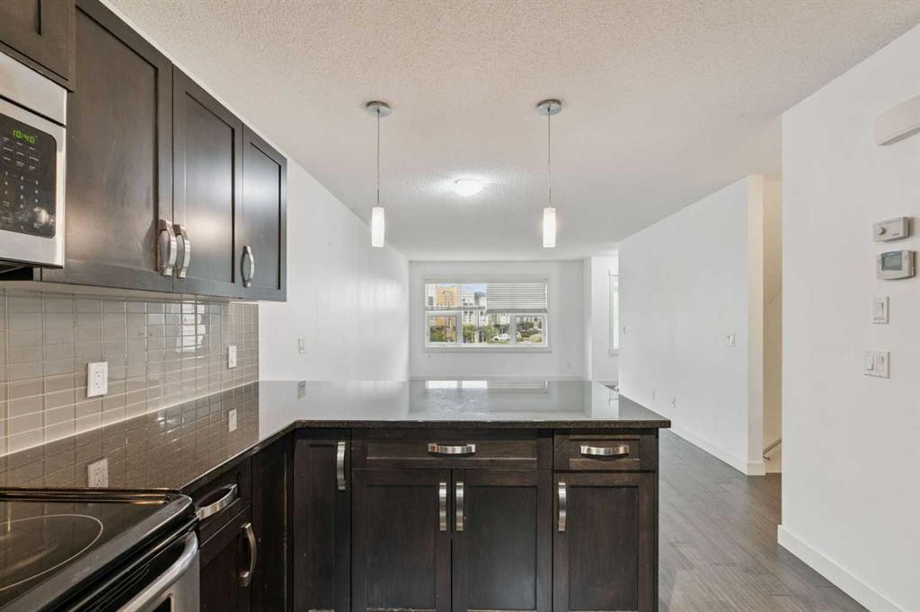 314 Covecreek Circle Ne, Calgary, AB - Indoor Photo Showing Kitchen With Upgraded Kitchen
