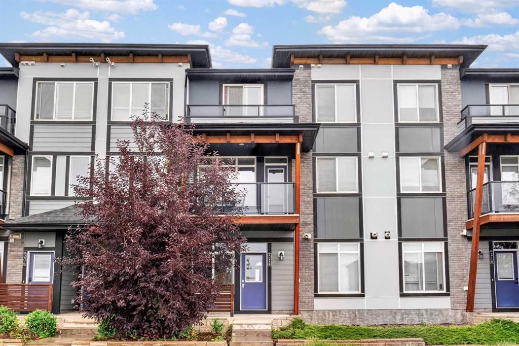 214 Seton Passage Se, Calgary, AB - Outdoor With Facade