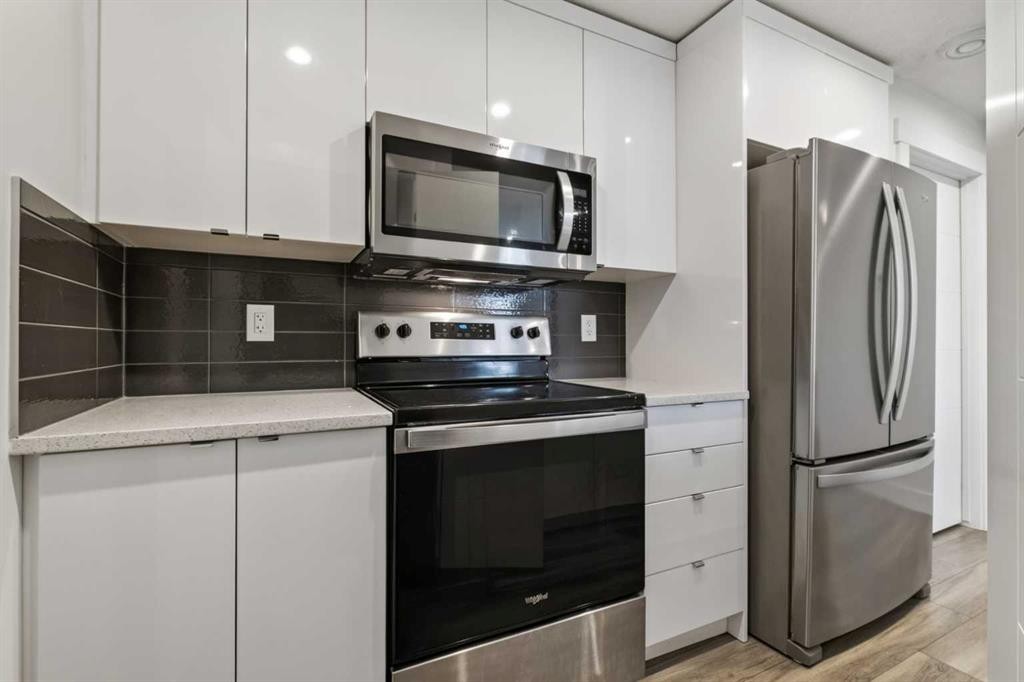 214 Seton Passage Se, Calgary, AB - Indoor Photo Showing Kitchen With Stainless Steel Kitchen With Upgraded Kitchen