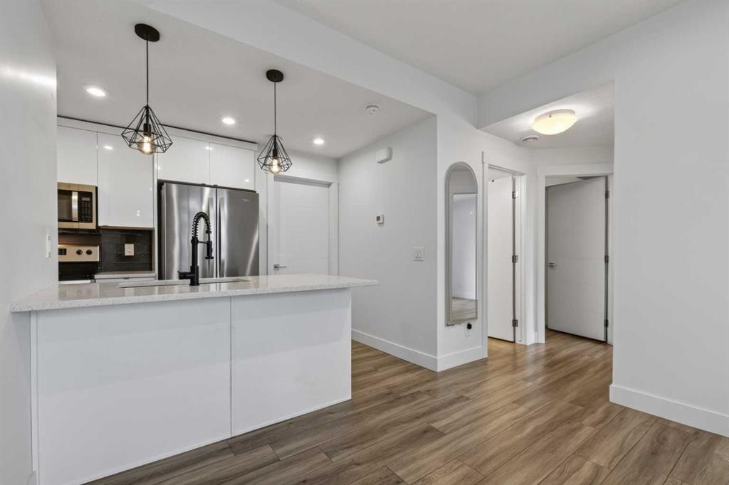 214 Seton Passage Se, Calgary, AB - Indoor Photo Showing Kitchen With Upgraded Kitchen