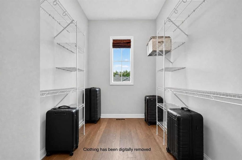 8 Spring Valley Lane Sw, Calgary, AB - Indoor With Storage