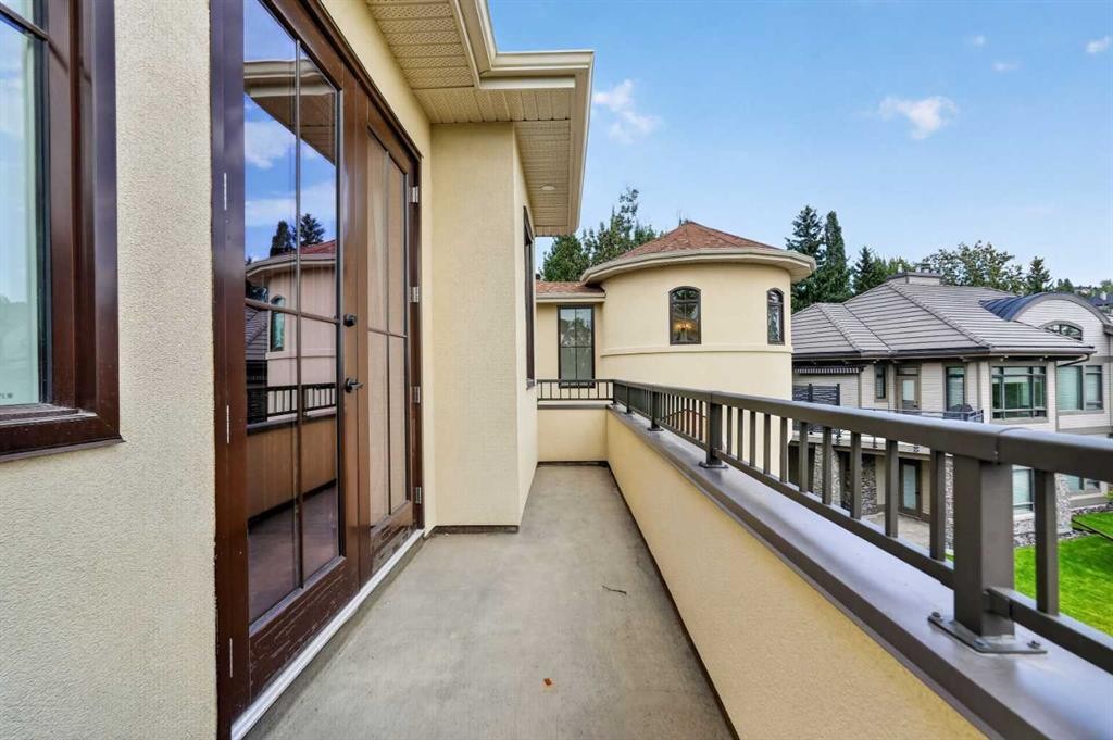 8 Spring Valley Lane Sw, Calgary, AB - Outdoor With Balcony With Exterior