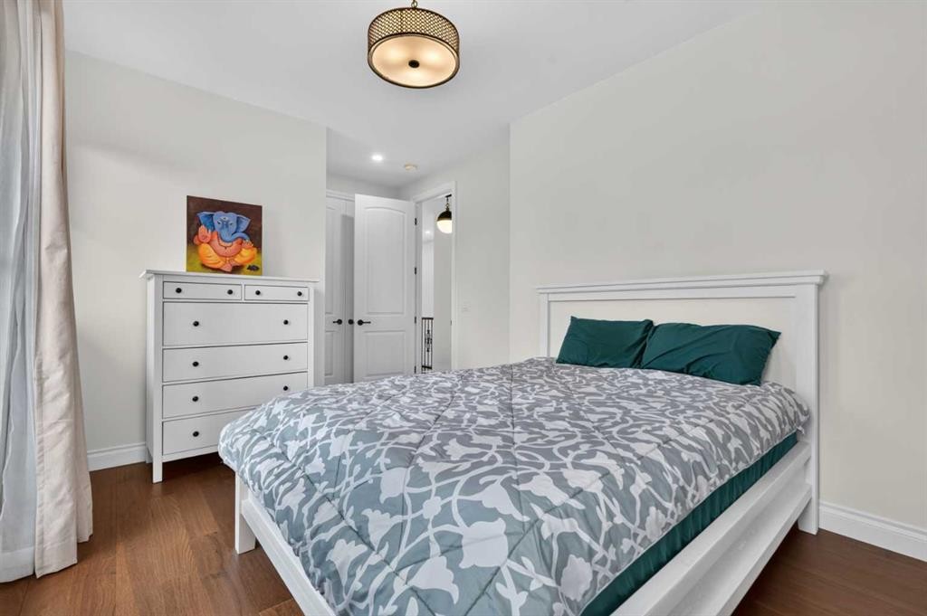 8 Spring Valley Lane Sw, Calgary, AB - Indoor Photo Showing Bedroom