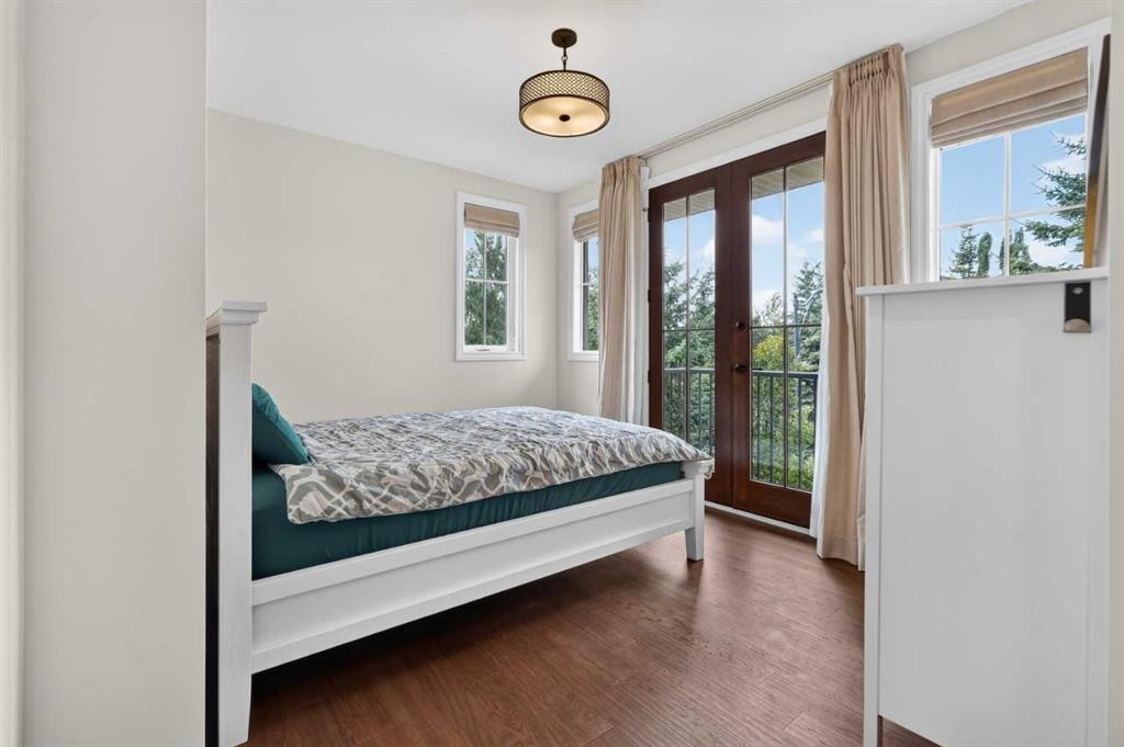 8 Spring Valley Lane Sw, Calgary, AB - Indoor Photo Showing Bedroom