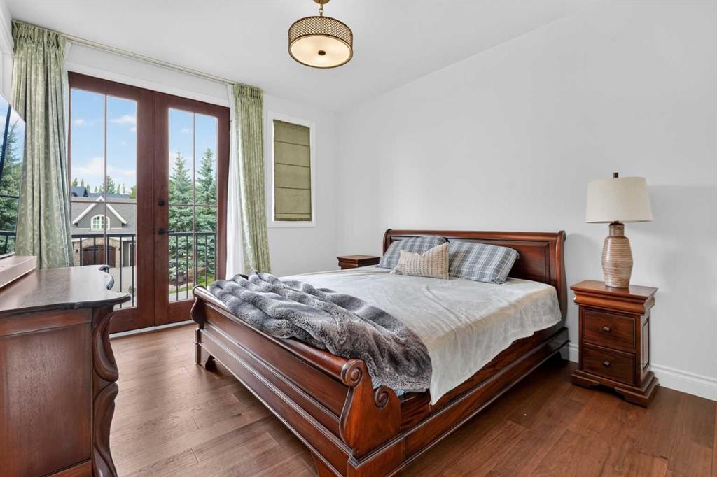 8 Spring Valley Lane Sw, Calgary, AB - Indoor Photo Showing Bedroom