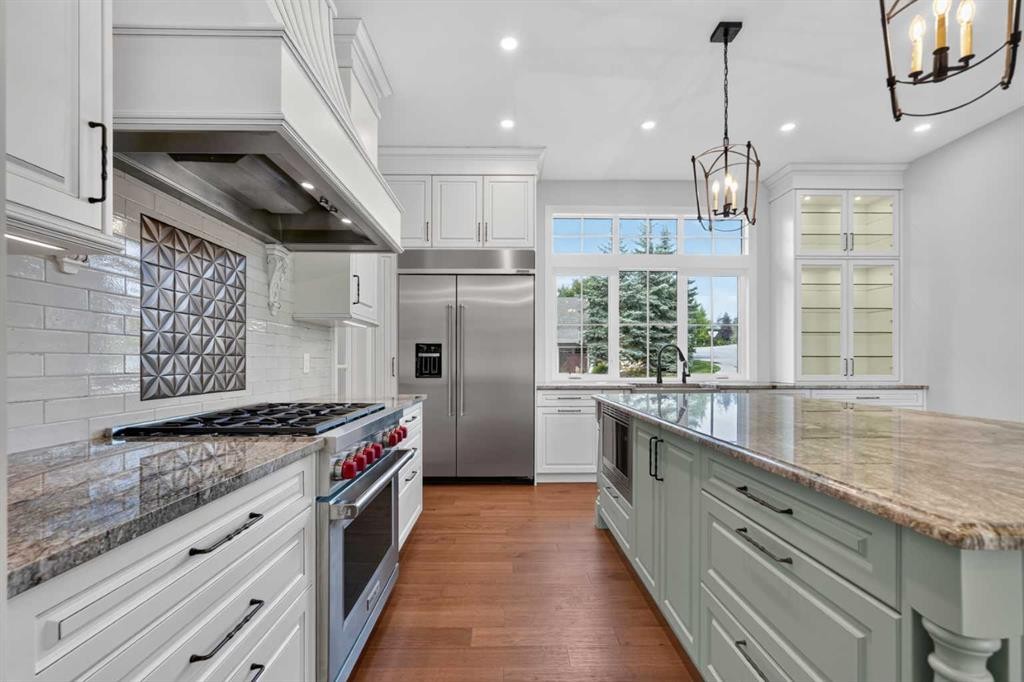 8 Spring Valley Lane Sw, Calgary, AB - Indoor Photo Showing Kitchen With Upgraded Kitchen