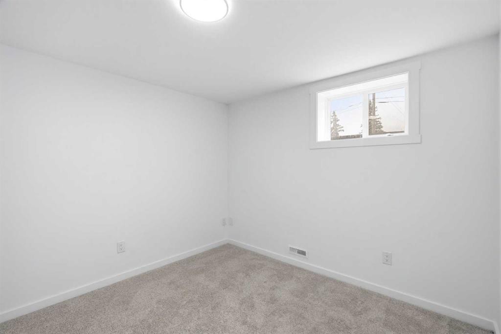52 Penedo Place Se, Calgary, AB - Indoor Photo Showing Other Room