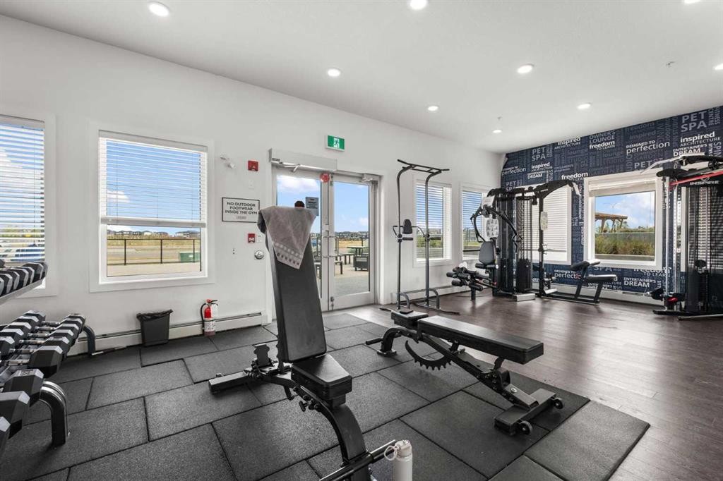 1425-76 Cornerstone Passage Ne, Calgary, AB - Indoor Photo Showing Gym Room