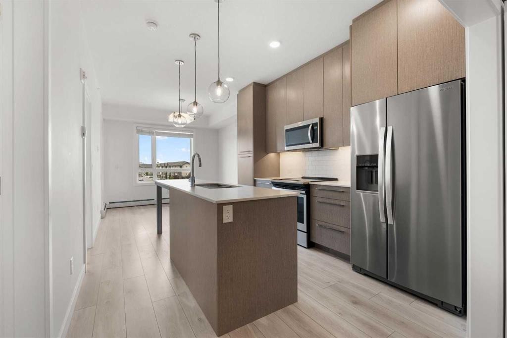 1425-76 Cornerstone Passage Ne, Calgary, AB - Indoor Photo Showing Kitchen With Stainless Steel Kitchen With Upgraded Kitchen