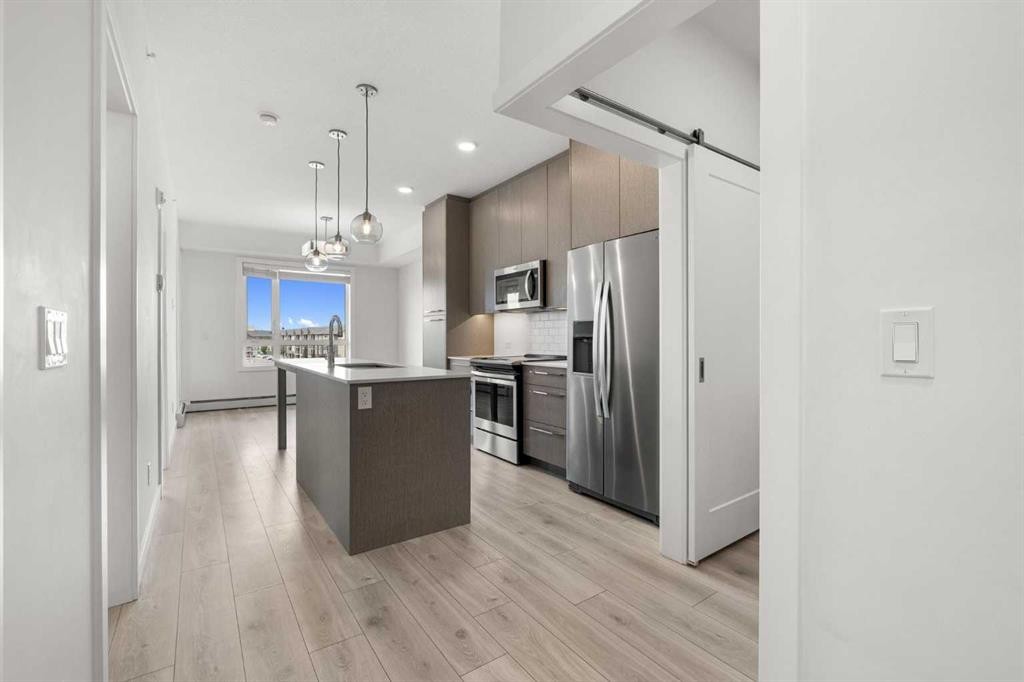 1425-76 Cornerstone Passage Ne, Calgary, AB - Indoor Photo Showing Kitchen With Stainless Steel Kitchen With Upgraded Kitchen