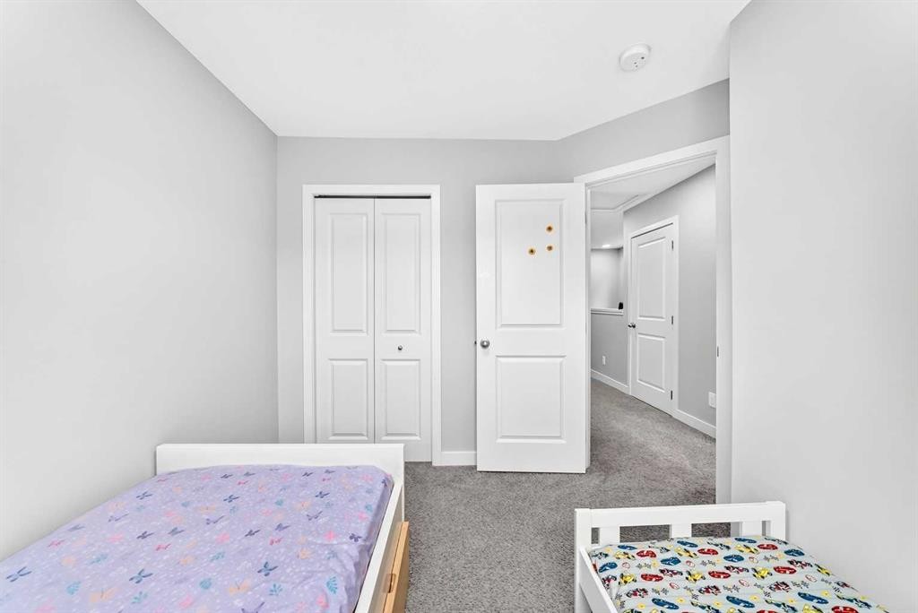 164 Langwell Common Se, Airdrie, AB - Indoor Photo Showing Bedroom