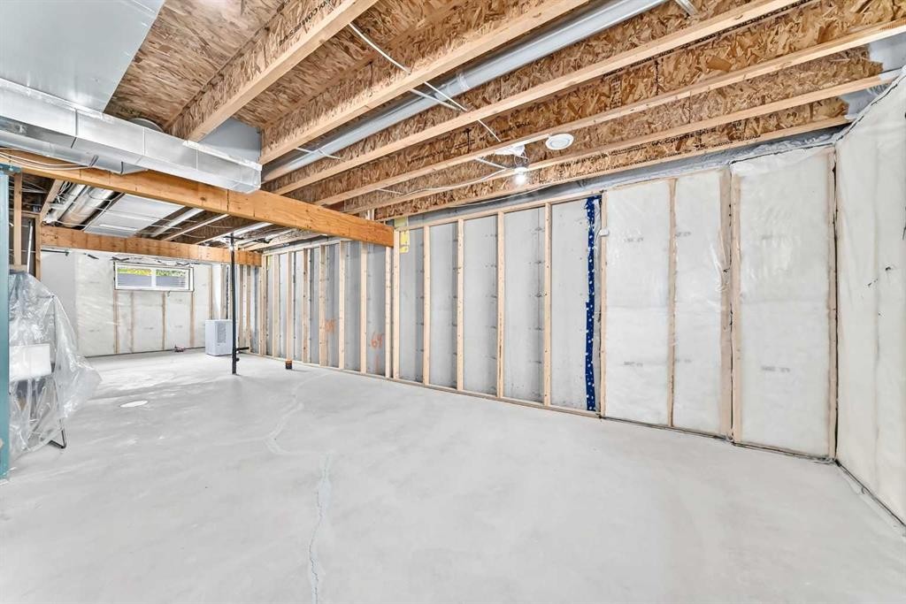164 Langwell Common Se, Airdrie, AB - Indoor Photo Showing Basement