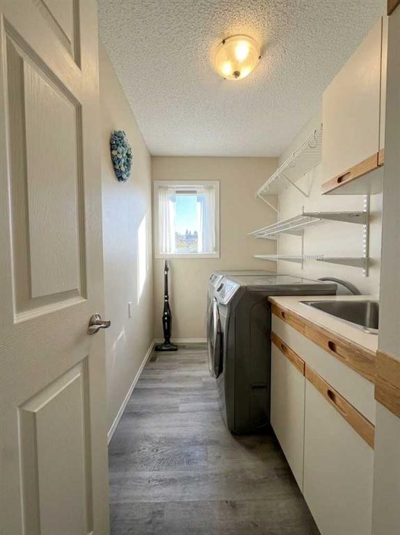 153 Hawkdale Circle Nw, Calgary, AB - Indoor Photo Showing Laundry Room