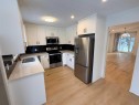 651 Macewan Drive Nw, Calgary, AB  - Indoor Photo Showing Kitchen With Double Sink 