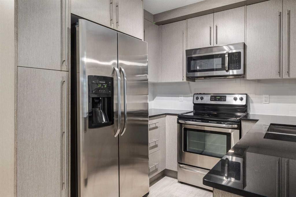 2108-11 Mahogany Row Se, Calgary, AB - Indoor Photo Showing Kitchen With Stainless Steel Kitchen