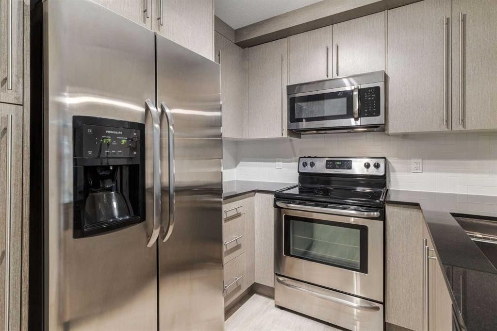 2108-11 Mahogany Row Se, Calgary, AB - Indoor Photo Showing Kitchen With Stainless Steel Kitchen