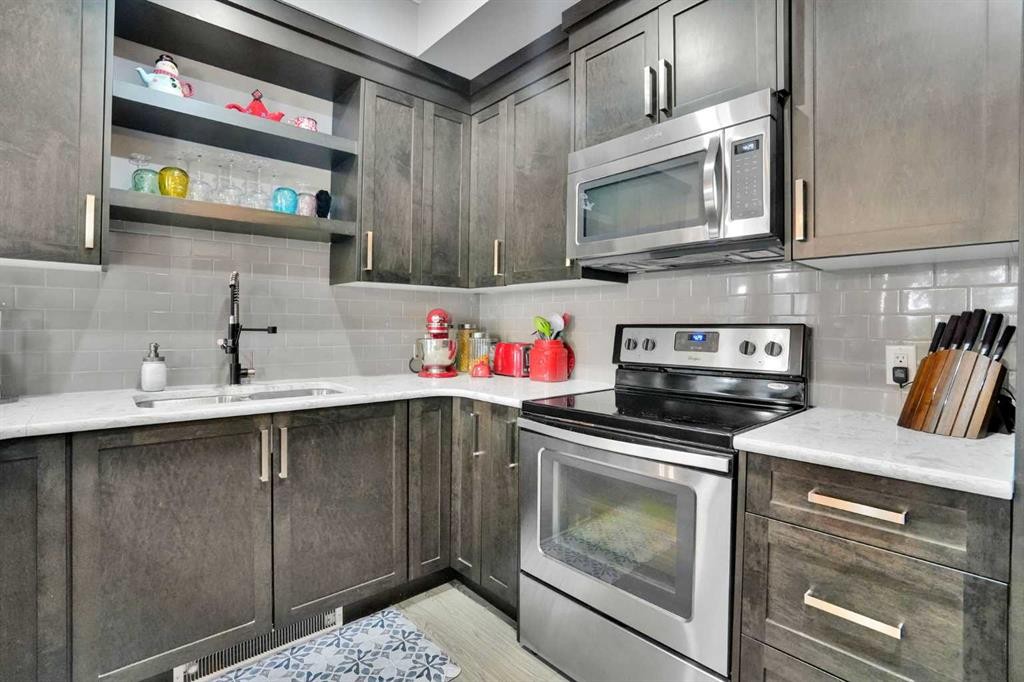 105-6603 New Brighton Avenue Se, Calgary, AB - Indoor Photo Showing Kitchen With Upgraded Kitchen