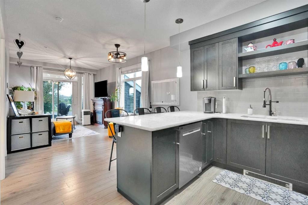 105-6603 New Brighton Avenue Se, Calgary, AB - Indoor Photo Showing Kitchen With Upgraded Kitchen