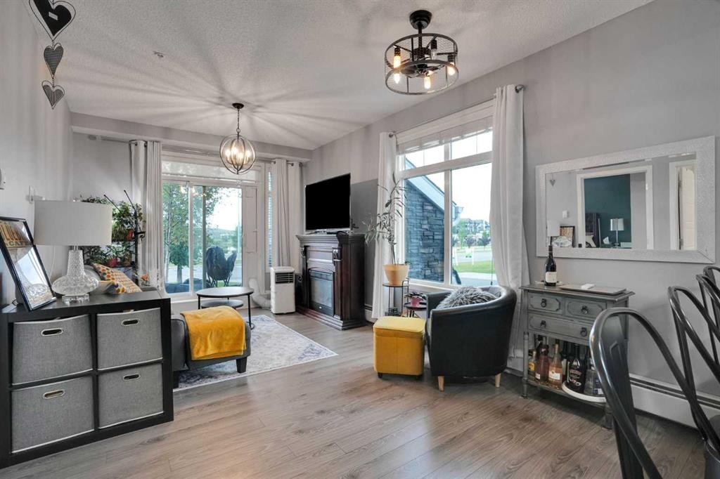 105-6603 New Brighton Avenue Se, Calgary, AB - Indoor With Fireplace
