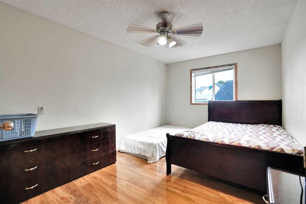 28 Martinridge Road Ne, Calgary, AB - Indoor Photo Showing Bedroom