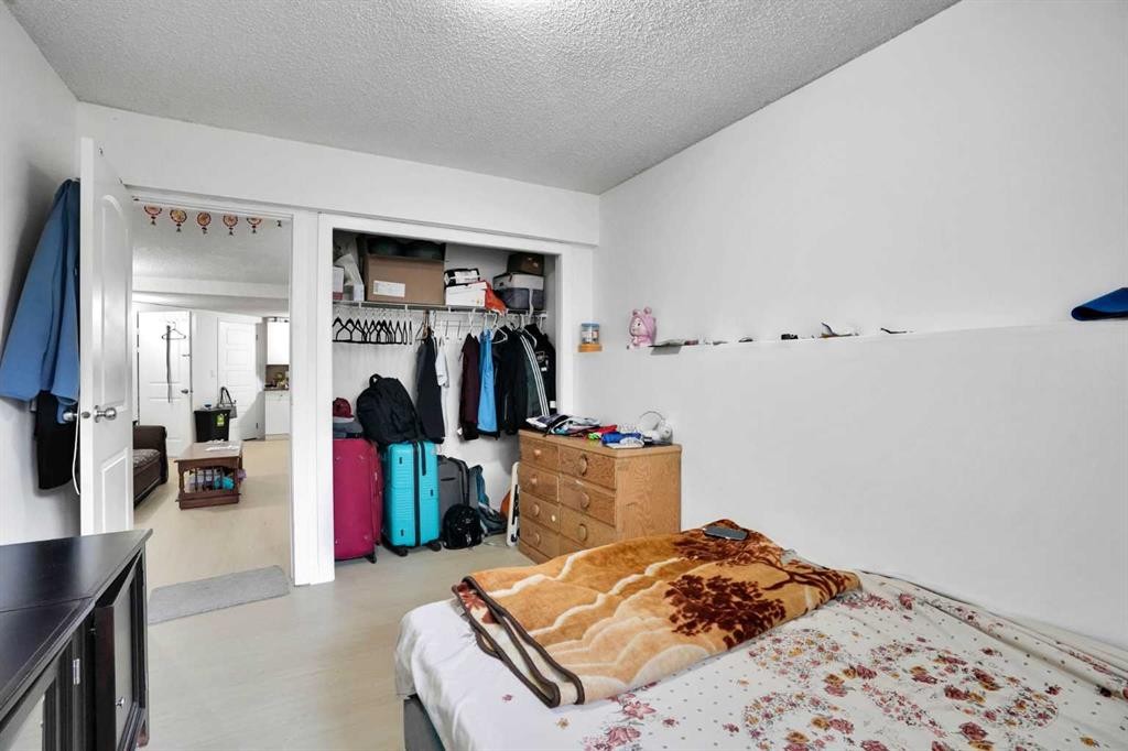 28 Martinridge Road Ne, Calgary, AB - Indoor Photo Showing Bedroom