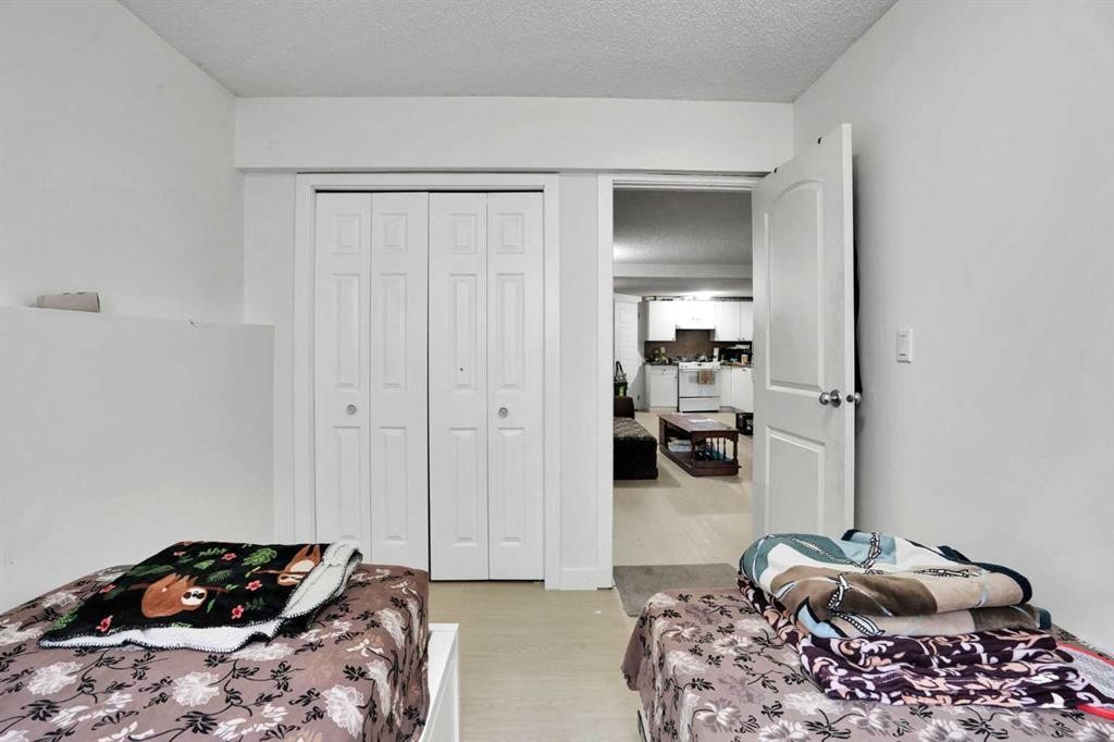 28 Martinridge Road Ne, Calgary, AB - Indoor Photo Showing Bedroom