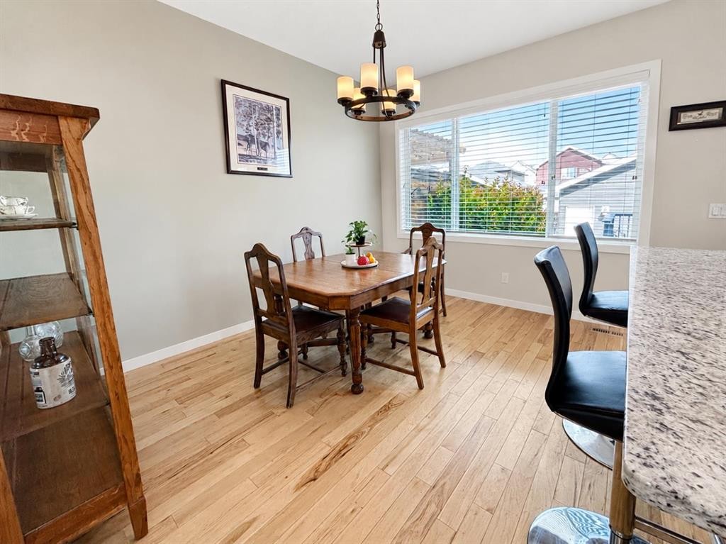 12 Fireside Bend, Cochrane, AB - Indoor Photo Showing Dining Room