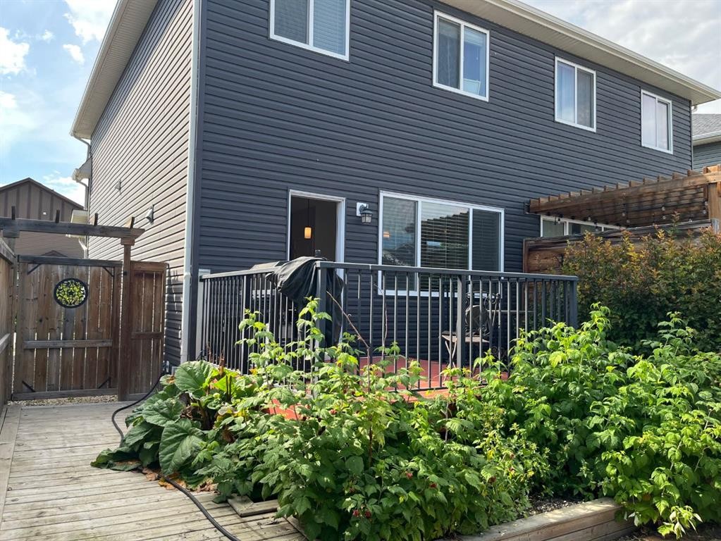 12 Fireside Bend, Cochrane, AB - Outdoor With Deck Patio Veranda With Exterior