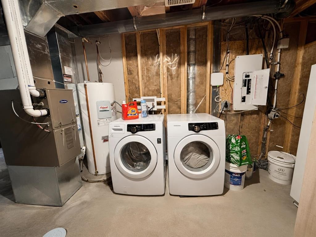 12 Fireside Bend, Cochrane, AB - Indoor Photo Showing Laundry Room