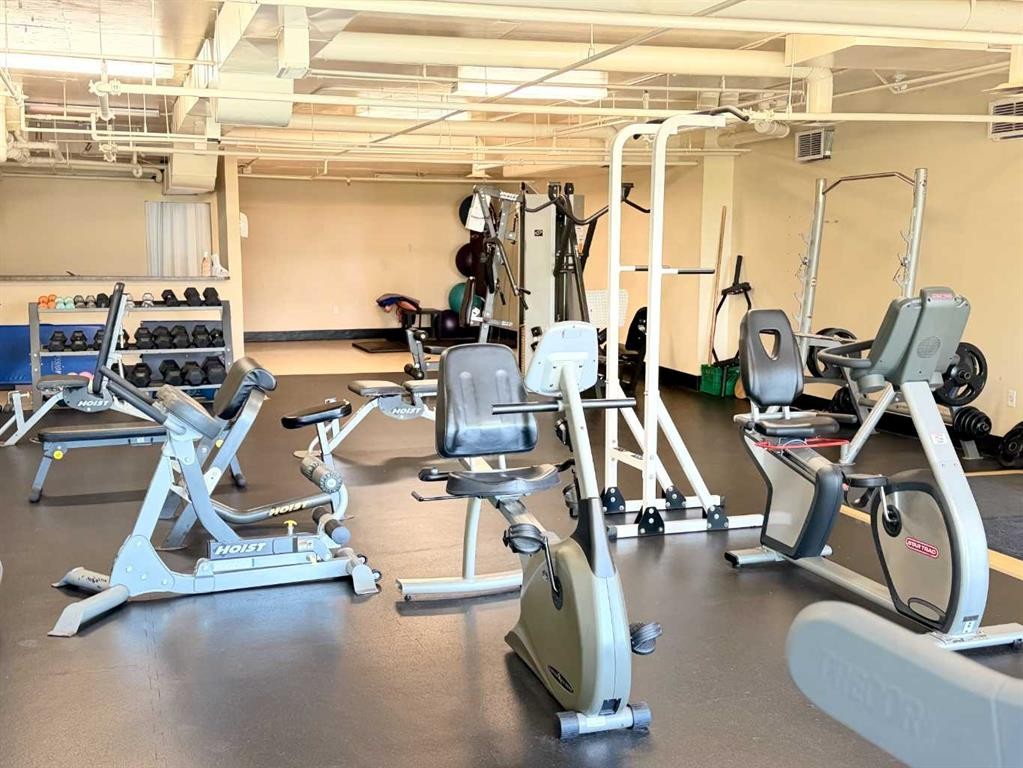 5-148 Rockyledge View Nw, Calgary, AB - Indoor Photo Showing Gym Room
