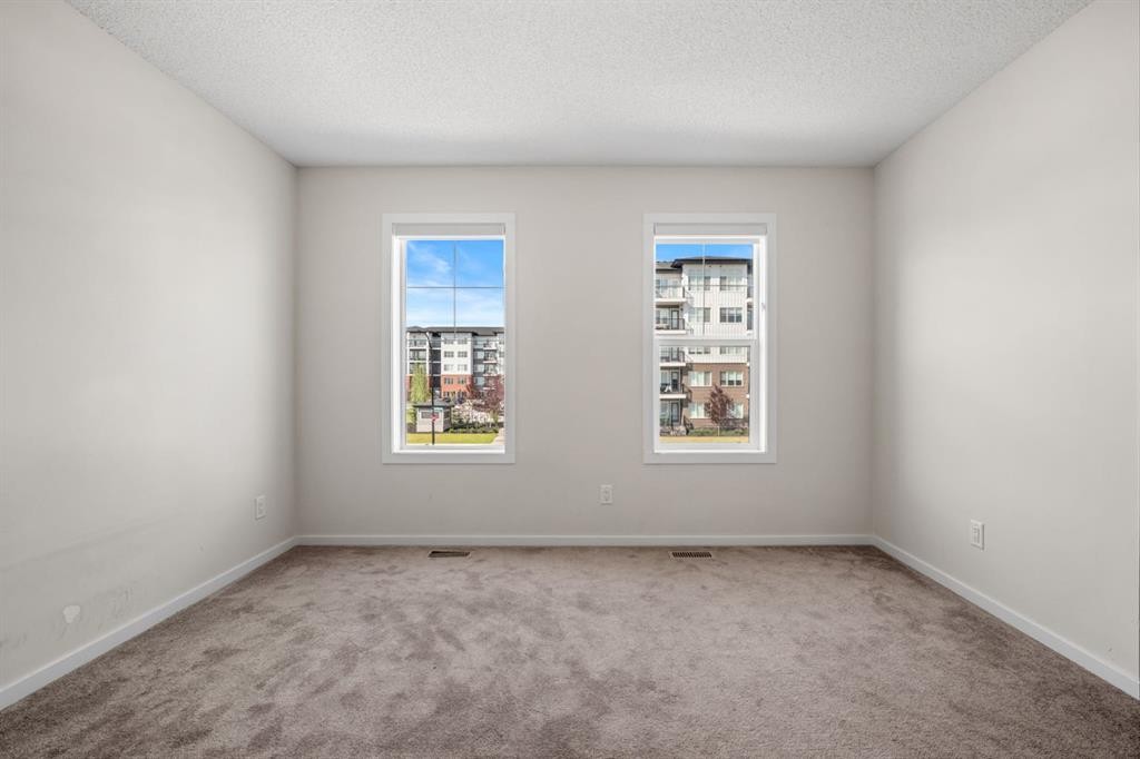 61 Cityline Gate Ne, Calgary, AB - Indoor Photo Showing Other Room